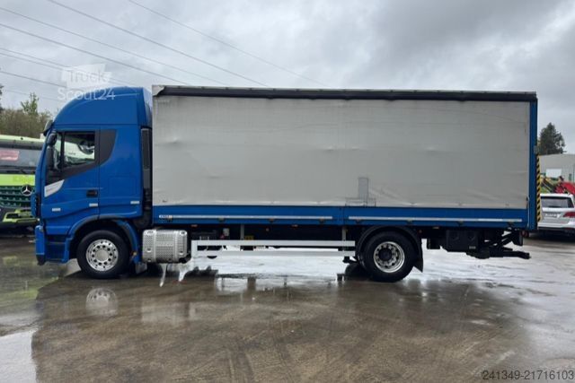 Platós teherautó ponyvával IVECO 420 Stralis 4x2