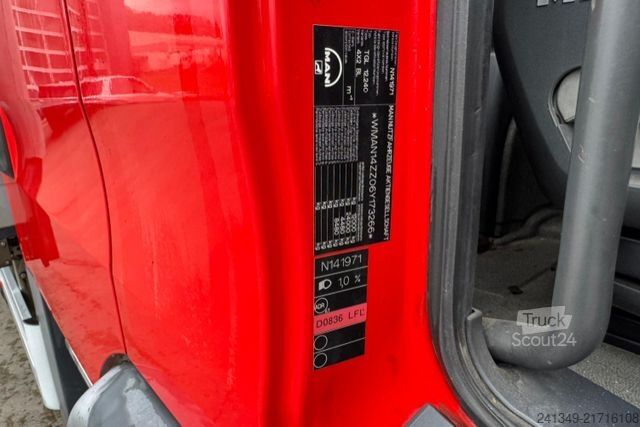 Camión plataforma con toldo MAN TGL 12.240 4x2 ADR