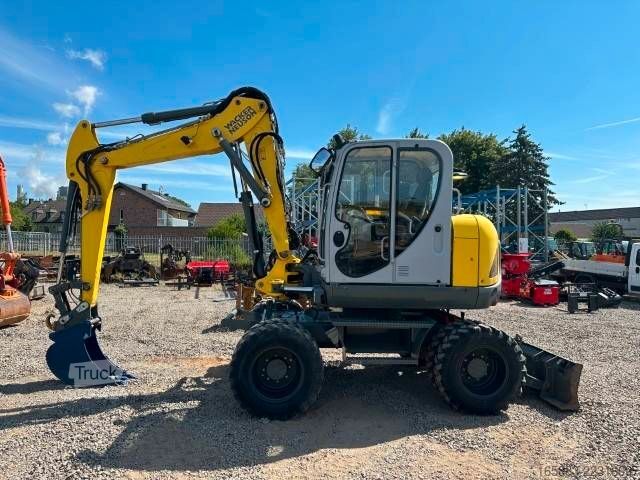 Mobiele graafmachine WACKER Neuson EW 100 Mobilbagger / AC/ 49.000 EUR