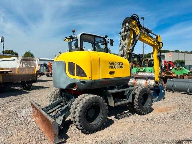 Mobiele graafmachine WACKER Neuson EW 100 Mobilbagger / AC/ 49.000 EUR
