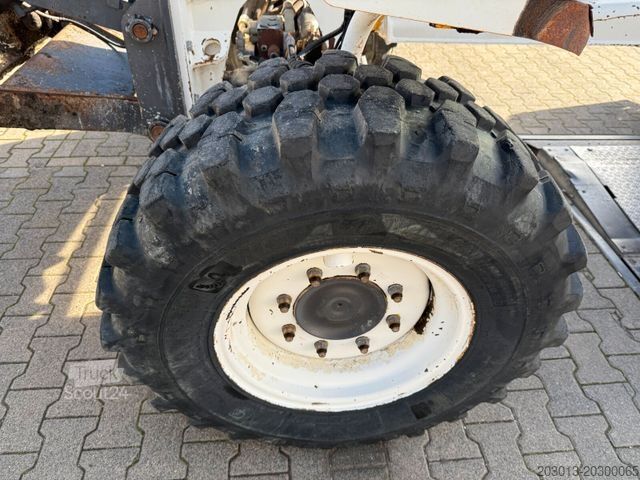 Niveleuse NEW HOLLAND F106.6A alrrad 6x6 Grader 12 Ton - 10.700 Std