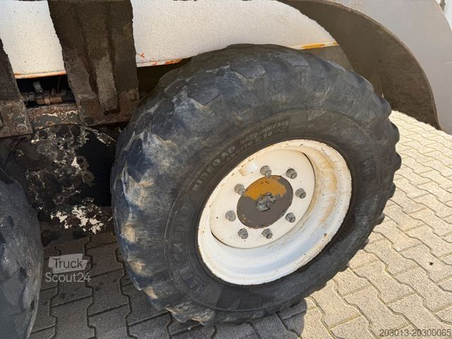 Niveleuse NEW HOLLAND F106.6A alrrad 6x6 Grader 12 Ton - 10.700 Std