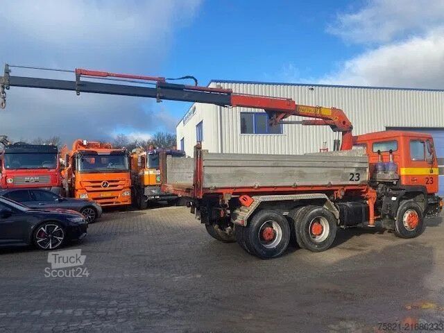 Volquete con grúa MAN 26.332 6x4 + Palfinger PK 12000