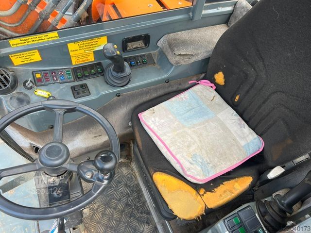 Pyöräalustainen kaivinkone AHLMANN HANSA 531 H 4x4