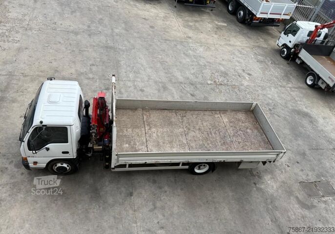 Camión de plataforma ISUZU NQR 75