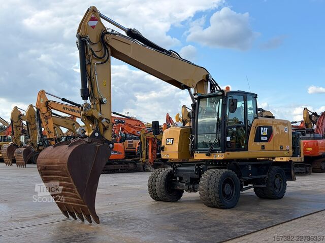 Колесный экскаватор Caterpillar M320F