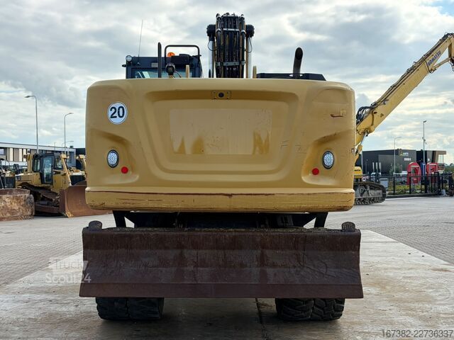Колесный экскаватор Caterpillar M320F