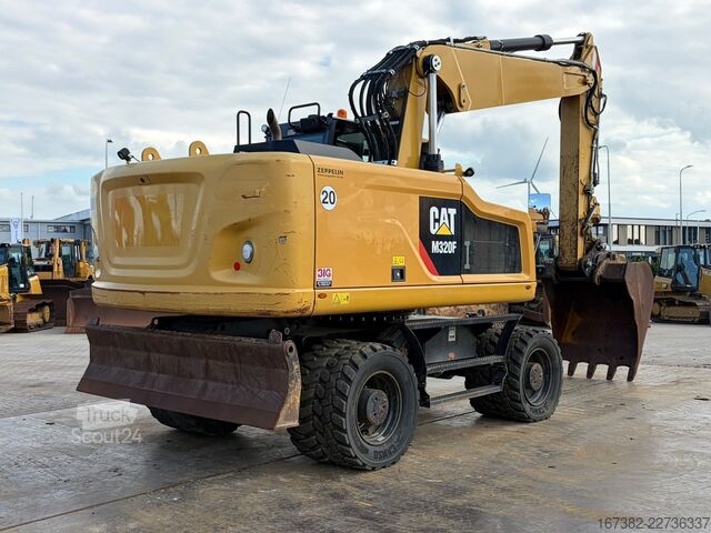 Колесный экскаватор Caterpillar M320F