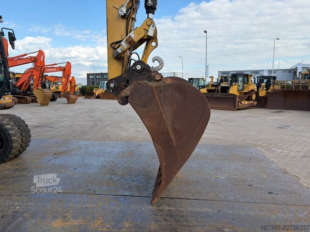Колесный экскаватор Caterpillar M320F