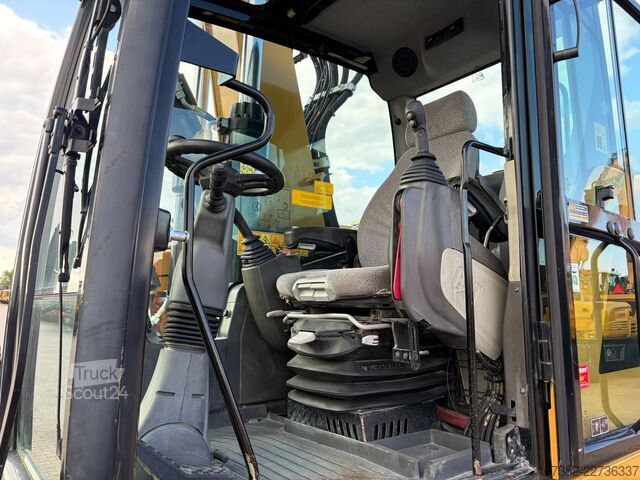 Колесный экскаватор Caterpillar M320F