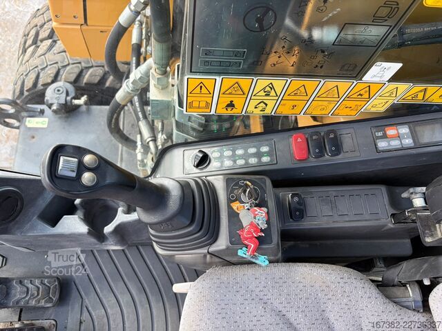 Колесный экскаватор Caterpillar M320F