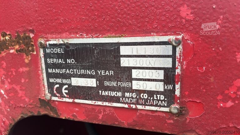 Chargeuse compacte sur chenilles Takeuchi TL130 with forks and loader bucket