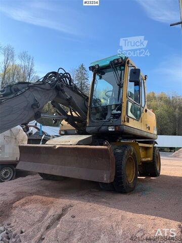 Ratinis ekskavatorius Volvo WE140B wheeled excavator with digging bucket