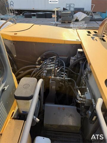 Pelle sur roues Volvo WE140B wheeled excavator with digging bucket