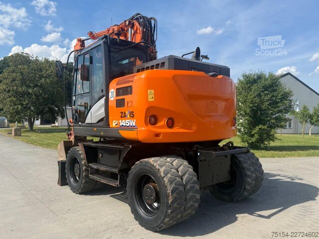 Escavatore gommato Hitachi ZX145W-6