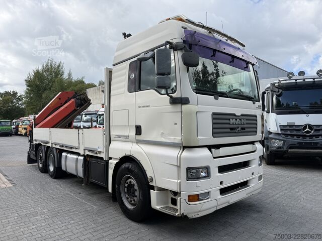 Ciężarówka z płaską platformą MAN TGA 26.480 6X2 Palfinger 29002 mit JIB