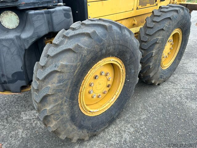 Road grader Caterpillar 140M Ripper + Pushblock