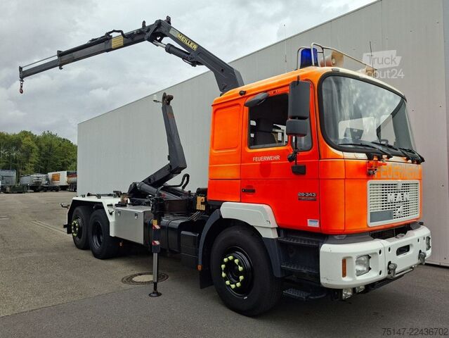 Haakarm vrachtwagen MAN 26.343 6x2*4 Meiller Abroller + Kran Feuerwehr