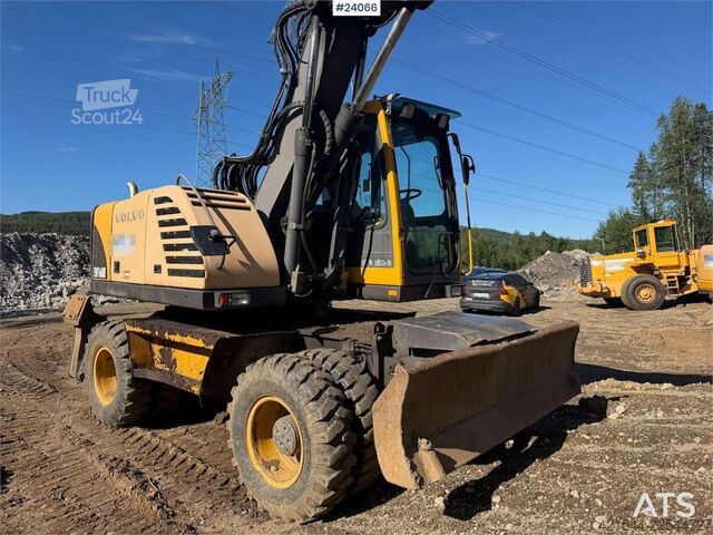 Pyörökaivukone Volvo EW160B w/ rototilt and two buckets. WATCH VIDEO