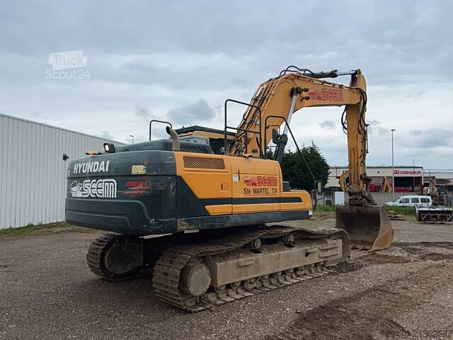Escavadora de rastos Hyundai HX300 NL with a bucket