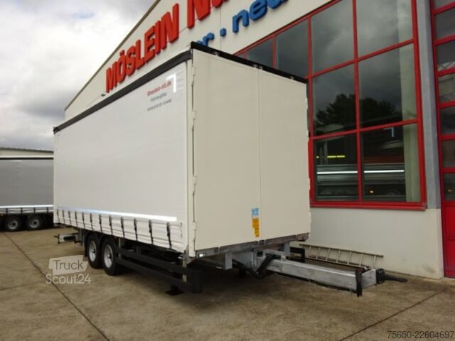 Відкритий причіп з тентом Möslein TPW 105 D Schwebheim  Tandem- Planenanhänger Durchladen