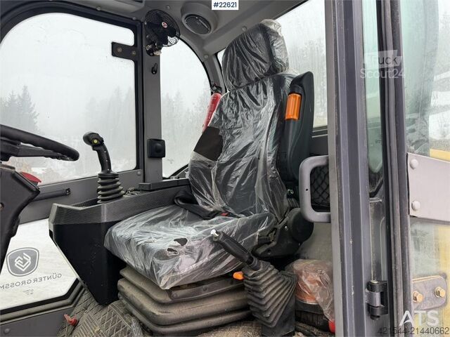 Yükleyici Günter Grossmann Ladowarka GG2500T telehandler with a bucket and l