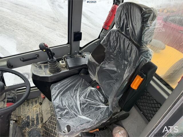 Yükleyici Günter Grossmann Ladowarka GG2500T telehandler with a bucket and l
