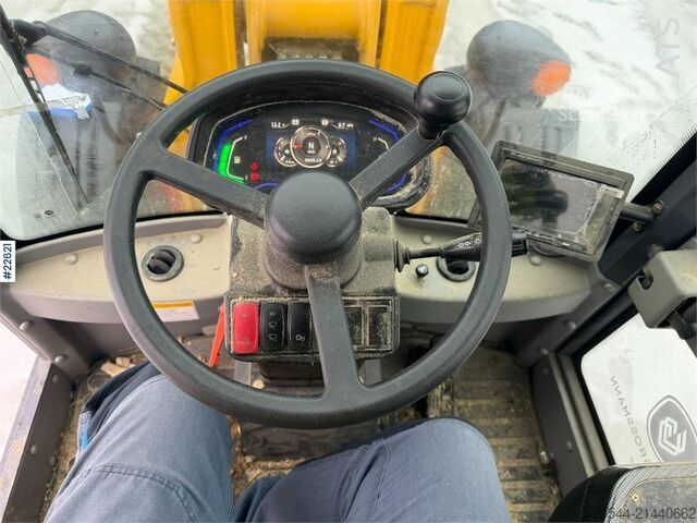 Yükleyici Günter Grossmann Ladowarka GG2500T telehandler with a bucket and l