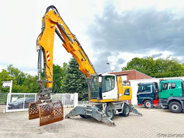 Pelle sur pneus LIEBHERR LH 24 Litronic mit Abbruch- / Sortiergreifer