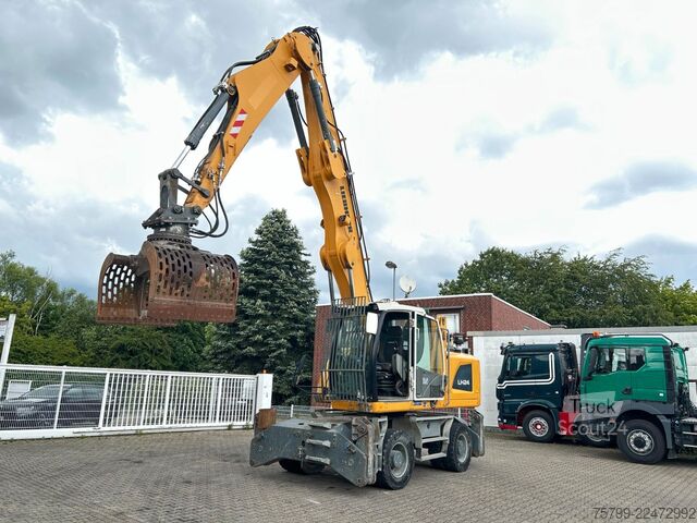 Pelle sur pneus LIEBHERR LH 24 Litronic mit Abbruch- / Sortiergreifer