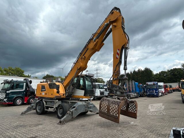 Pelle sur pneus LIEBHERR LH 24 Litronic mit Abbruch- / Sortiergreifer