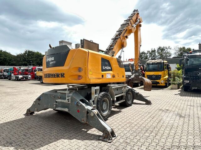 Pelle sur pneus LIEBHERR LH 24 Litronic mit Abbruch- / Sortiergreifer