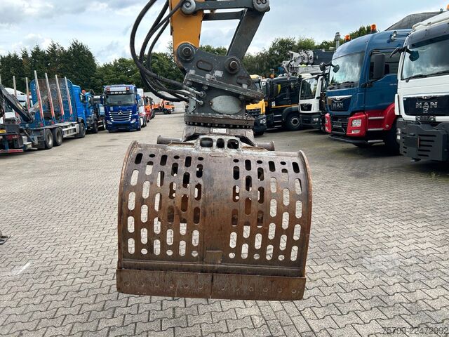 Pelle sur pneus LIEBHERR LH 24 Litronic mit Abbruch- / Sortiergreifer