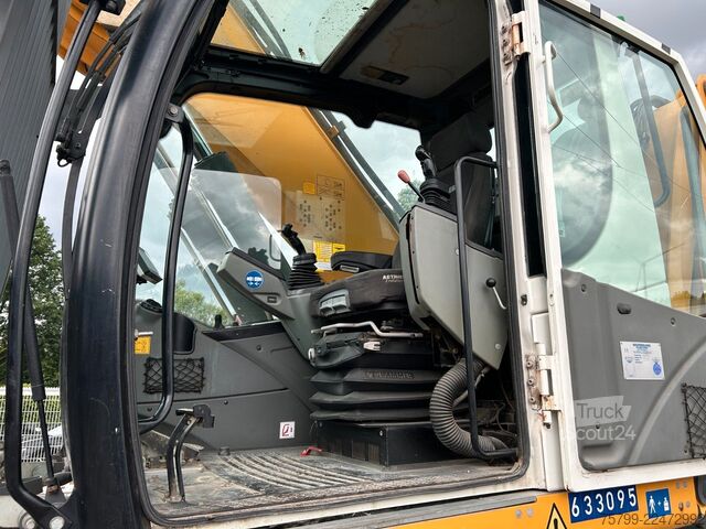 Pelle sur pneus LIEBHERR LH 24 Litronic mit Abbruch- / Sortiergreifer