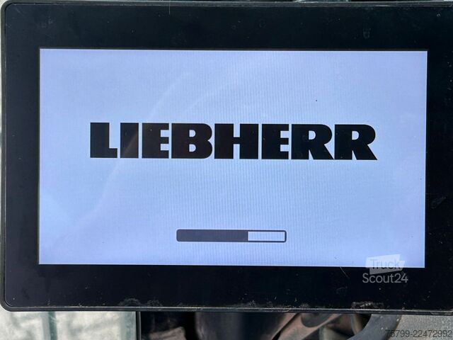 Pelle sur pneus LIEBHERR LH 24 Litronic mit Abbruch- / Sortiergreifer