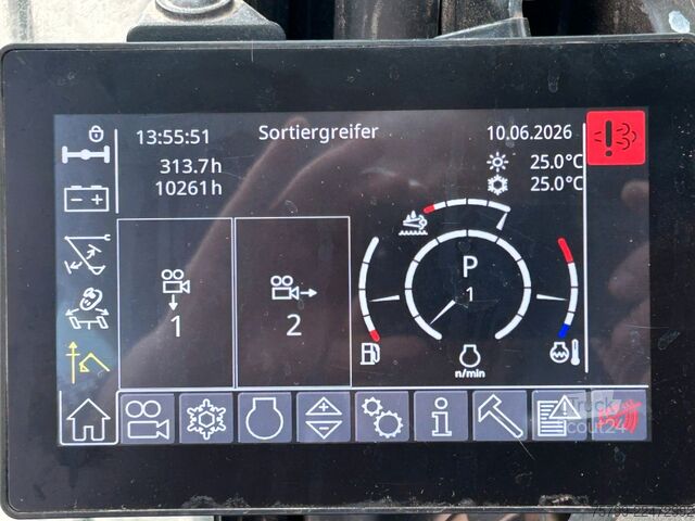 Pelle sur pneus LIEBHERR LH 24 Litronic mit Abbruch- / Sortiergreifer