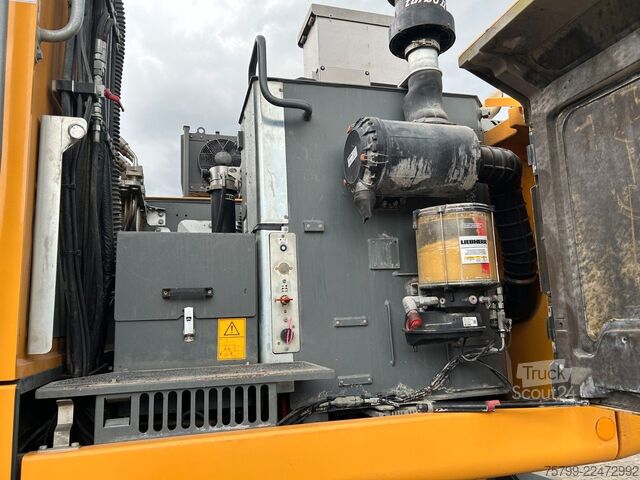 Pelle sur pneus LIEBHERR LH 24 Litronic mit Abbruch- / Sortiergreifer