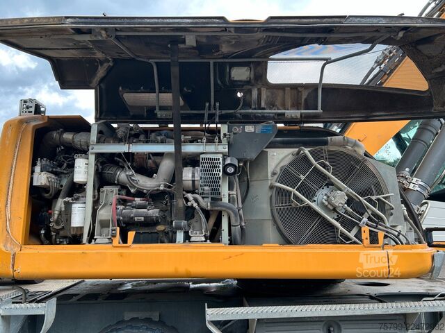 Pelle sur pneus LIEBHERR LH 24 Litronic mit Abbruch- / Sortiergreifer