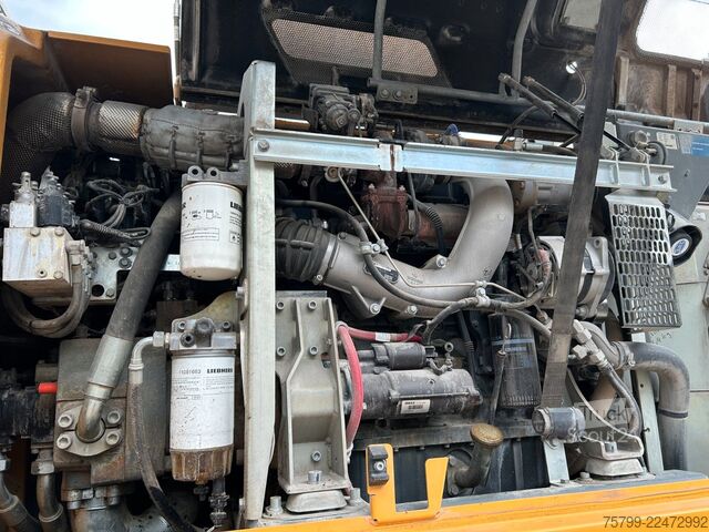 Pelle sur pneus LIEBHERR LH 24 Litronic mit Abbruch- / Sortiergreifer