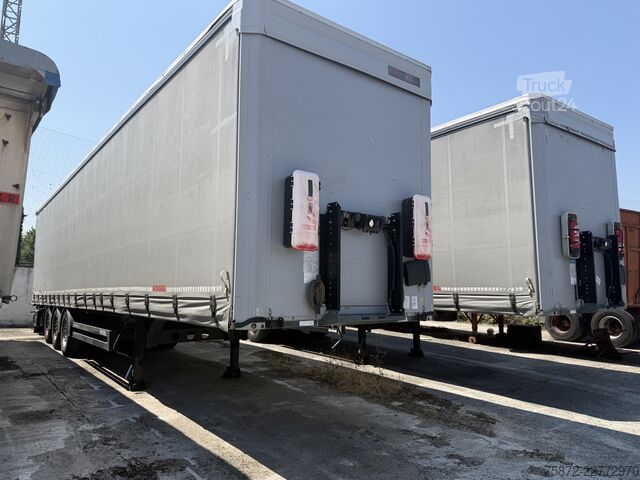 Semi-remorque bâchée Kögel TAULINER SN24 ELEVACION MULTI PUNTO