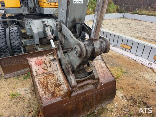Radbagger Åkerman EW130 wheel digger w/ a bucket. WATCH VIDEO