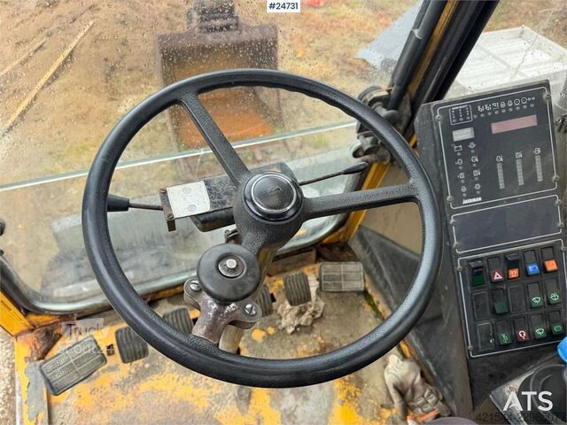 Radbagger Åkerman EW130 wheel digger w/ a bucket. WATCH VIDEO