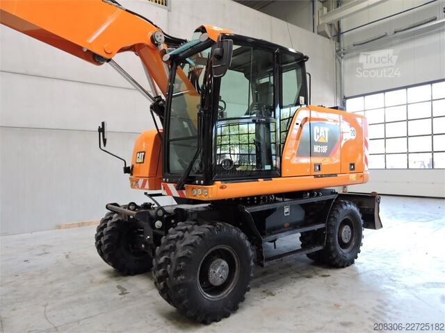 Escavatore gommato CATERPILLAR M318F
