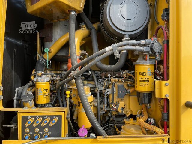 Silniční grejdr Caterpillar 12M (12G/12H/140M)