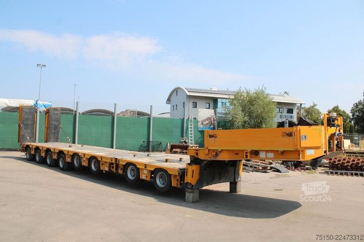 Semiremorcă cu platformă joasă MEUSBURGER SemiTieflader 2+6 Achs hydraul. gefedert Nr 121