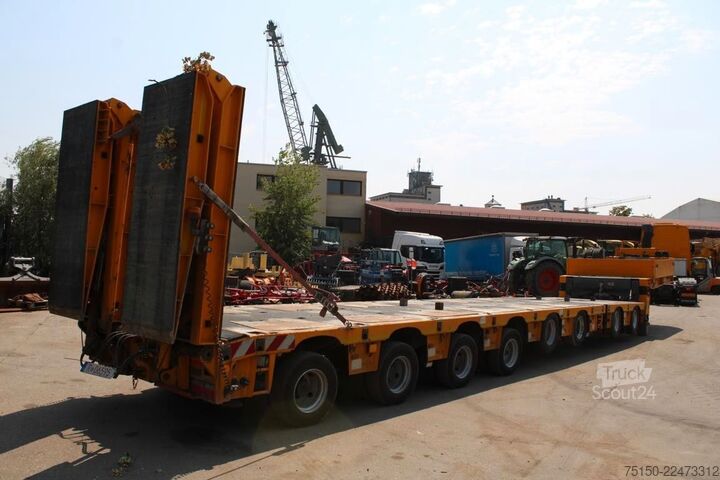 Semiremorcă cu platformă joasă MEUSBURGER SemiTieflader 2+6 Achs hydraul. gefedert Nr 121
