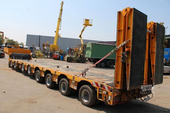 Semiremorcă cu platformă joasă MEUSBURGER SemiTieflader 2+6 Achs hydraul. gefedert Nr 121
