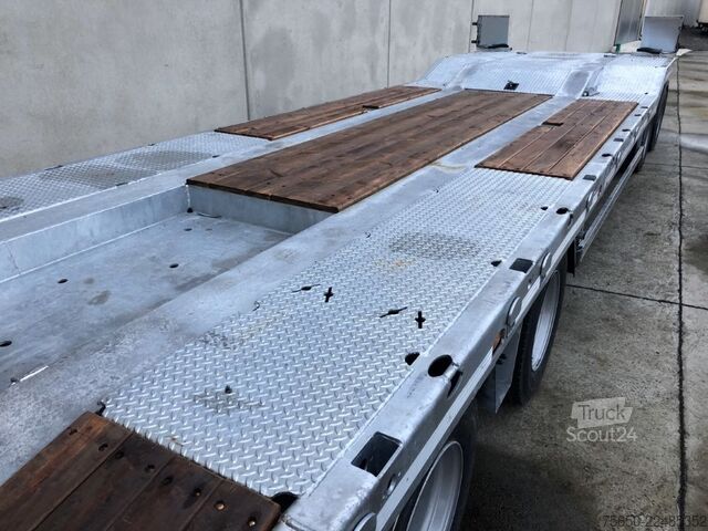 Remorcă cu platformă joasă Möslein T 4 VB H1  neuer 4 Achs Tieflader hydraulischen Rampen
