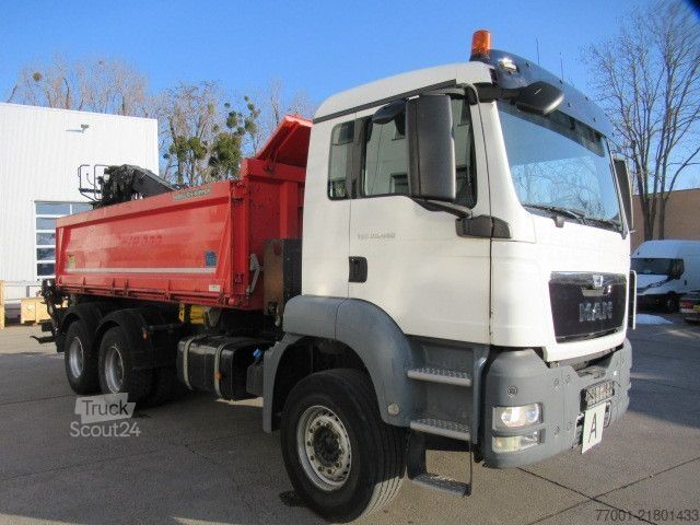 Camión volquete MAN 26.440 / 6 x 4 / Jonsered 1100 / Greifer