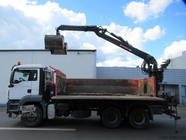 Camión volquete MAN 26.440 / 6 x 4 / Jonsered 1100 / Greifer